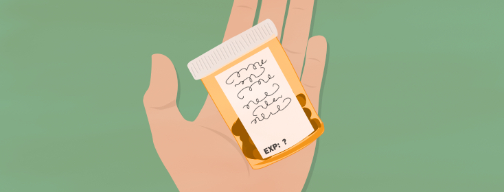 hand holding prescription bottle with pills, no expiration date