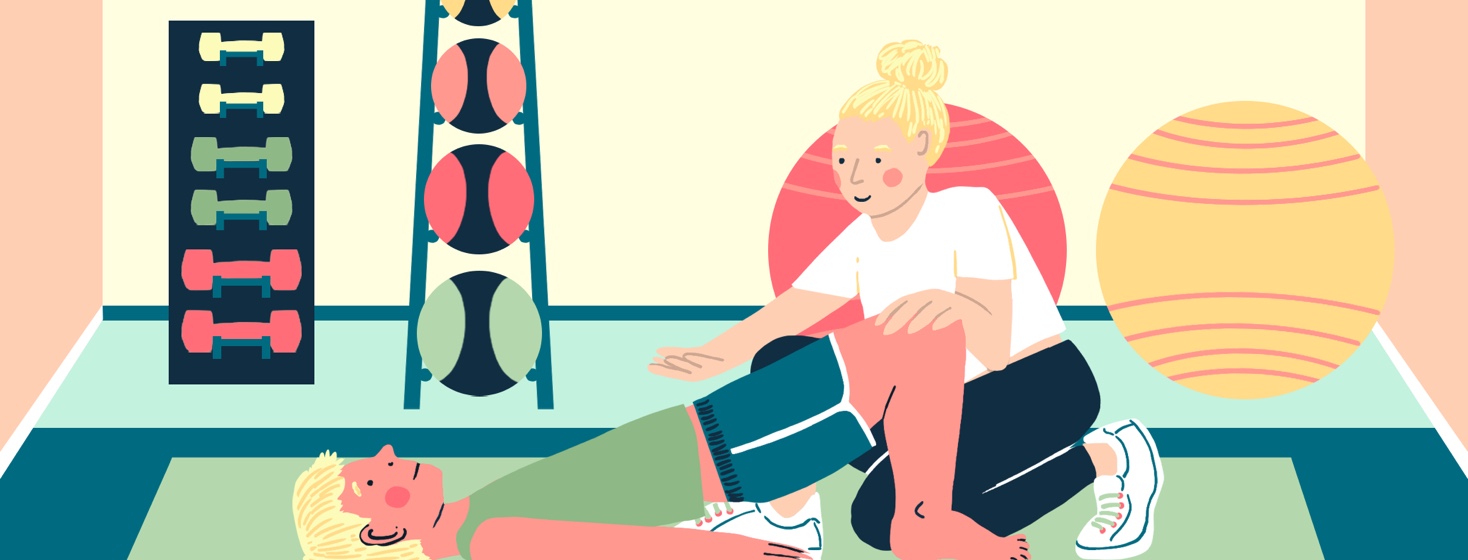 Personal trainer guiding a man through an exercise