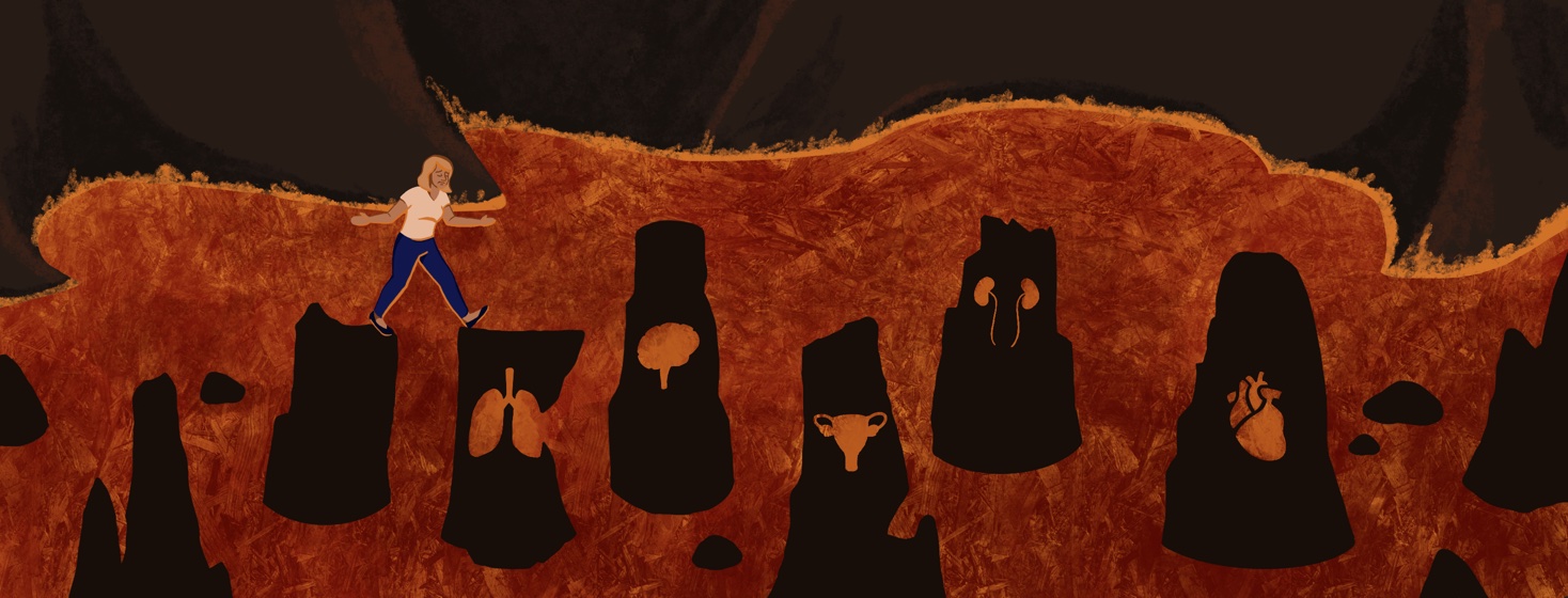 A woman walks across lava on rocks with cutouts shaped like several different organs.