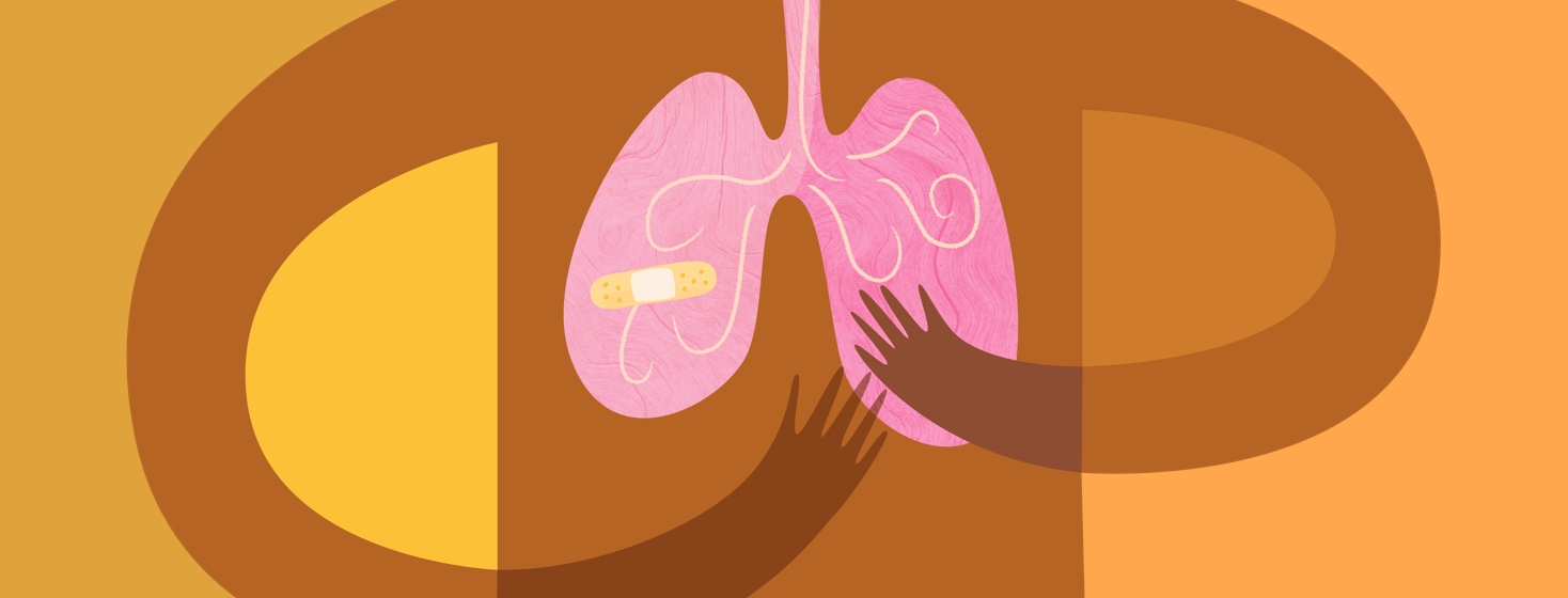 hands holding lung with bandaid