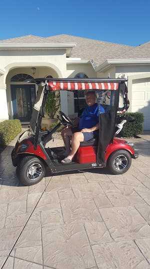 jeff riding golf cart