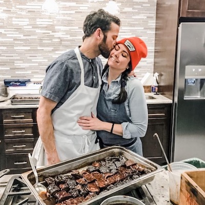 Jim and Kristina Burke cooking in a kitchen