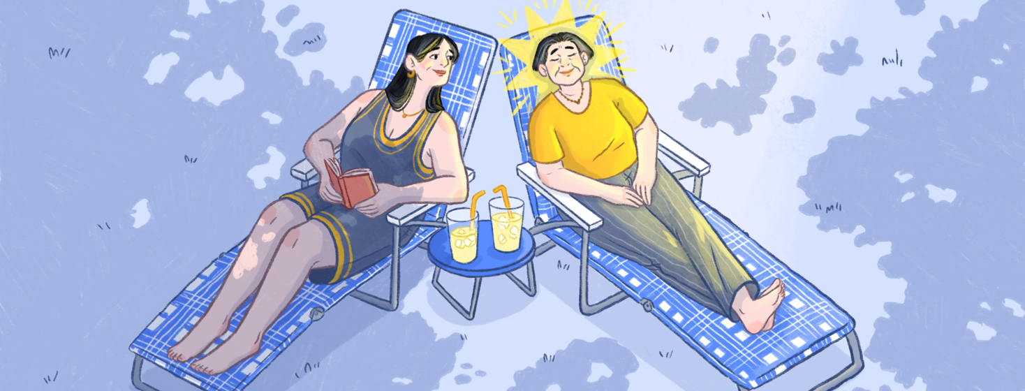 Two women relaxing in lawn chairs drinking lemonade