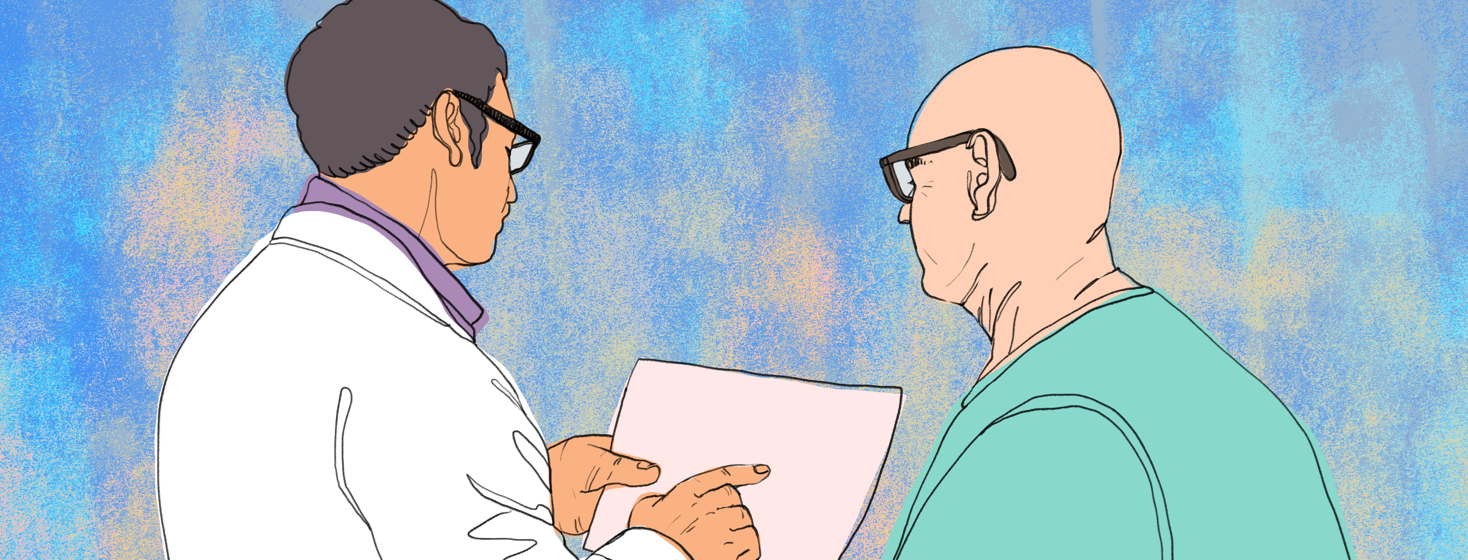 A doctor and patient looking over test results